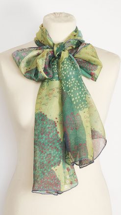 Thea Porter Lebanon silk scarf tied in a bow on mannequin in sheer green silk chiffon