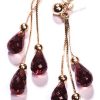 The new Ava Joy Earrings in garnet and 14ct yellow gold