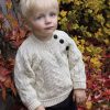Soft merino wool crew neck sweater with buttons for baby boys and girls