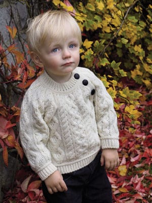 Soft merino wool crew neck sweater with buttons for baby boys and girls