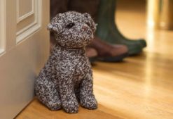 A smart Border terrier at your service: Dora Designs doorstop: a friend in waiting