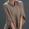 Smart and soft cashmere-silk blend textured roll-neck poncho from Italy