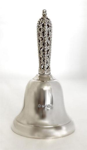 Fine English sterling silver dinner bell with filigree handle