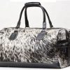 Ultra-cool hairy cowhide holdall for stylish getaways