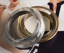 Double Aria: harmonious high-fashion bangles in washed gold and silver