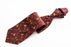 Flying pheasant and shotguns on burgundy pure silk tie
