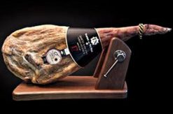 Top-notch Serrano Reserva Ham with traditional wooden carving stand and carving knife: amazingly good deal