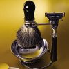 Gentlemen's shaving stand with brush and razor