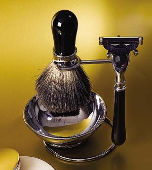 Gentlemen's shaving stand with brush and razor