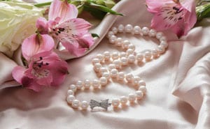 Classic beauty: New Natural Pearl, Diamond and 14ct Gold Necklace from the Bow Collection