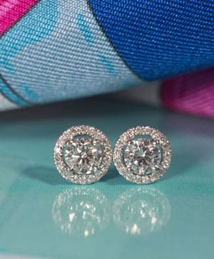 Eyecatching .65 carat Diamond Halo Earrings set in 18ct White Gold