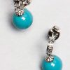 Turquoise and sterling silver Arabesque Earrings by Aleyne