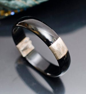 Dramatic black onyx and sterling silver Park Avenue Bangle, £53