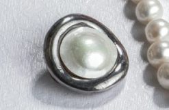 Eyecatching large natural mabé pearl and sterling silver brooch