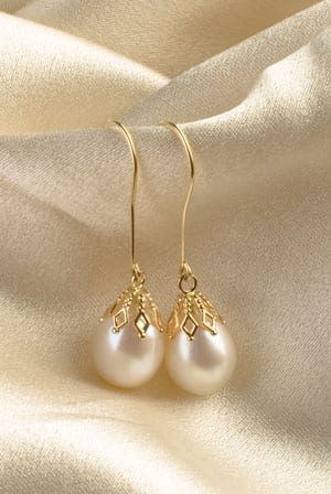 Stunning natural teardrop pearl and 14ct gold Sirena earrings
