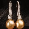 Precious natural gold pearl, diamond and 14ct white gold earrings from the South Seas