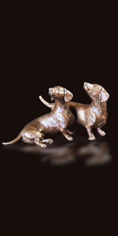 Limited Edition Bronze 'Dachshund Pair': a beautifully captured work of art by leading international wildlife sculptor by Michael Simpson