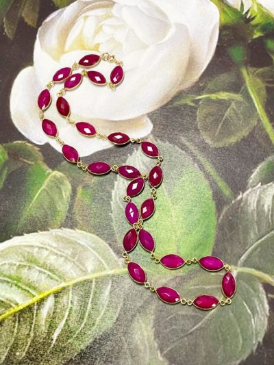 Marquise-cut Rubies and Gold create the lovely Pompadour Necklace in the shape of the perfect smile