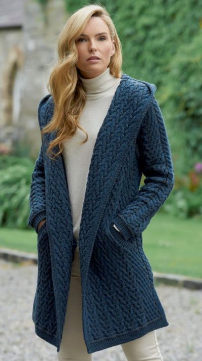 Herringbone stitch gives this elegant, soft and relaxed edge to edge hooded merino wool  jacket by West End Knitwear a unique style: three gorgeous colours, mallard blue, purple and natural oatmeal