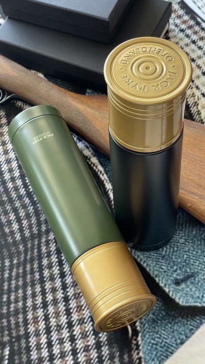 Smart gadget from Bisley: a vacuum flask which thinks it's a shotgun cartridge: great for all who need hot drinks on the go: in green or black, both with gold tops