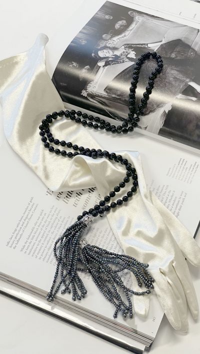 Fabulously flattering polished natural black onyx, natural pearl, silver and crystal Ferrari necklace: lariat style, at 48in it is long and versatile enough to create a series of contemporary moods