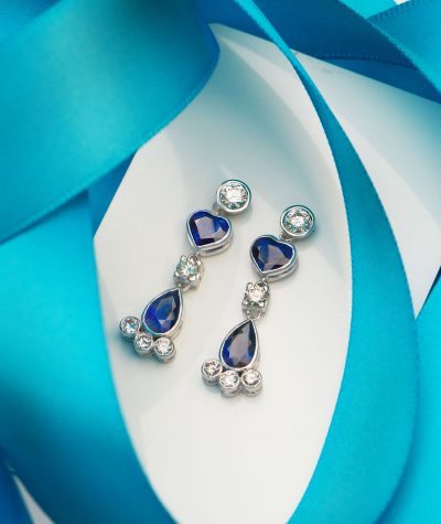 Blue sapphire and diamond earrings from Hatton Garden: stunningly beautiful natural blue Ceylon sapphires and round brilliant cut natural diamonds set in 18ct white gold in a design masterpiece with a romantic heart motif