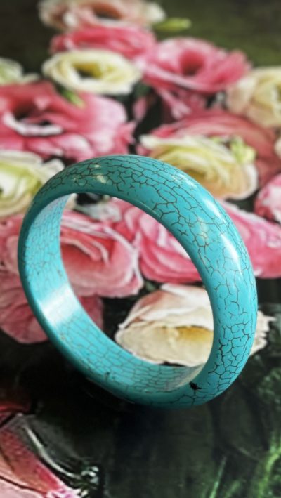 Instant Spring update: the turquoise asymmetric bangle by Aleyne