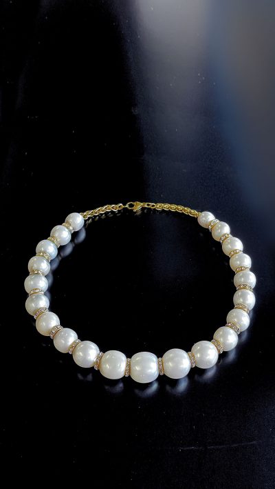 From Chanel to Jimmy Choo, here's classic elegance and contemporary style in the new Constellation Choker in natural Pearls, Swarovski Crystal and White and Yellow Gold Vermeil