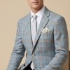 Man wearing Gurteen Florence jacket in soft blue Lanificio di Pray plaid summer blazer