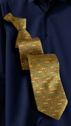 William Evans Safari Tie in pure silk: bison herd on green ground