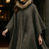 Warmth, drama and refinement: the new Ella Cape elevates every occasion—including putting on the Ritz!