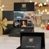 CountryClubuk black gift box with gold ribbon containing luxury gift voucher £250–£10,000 – Savoy, Orient-Express & Regent Seven Seas at Member rates