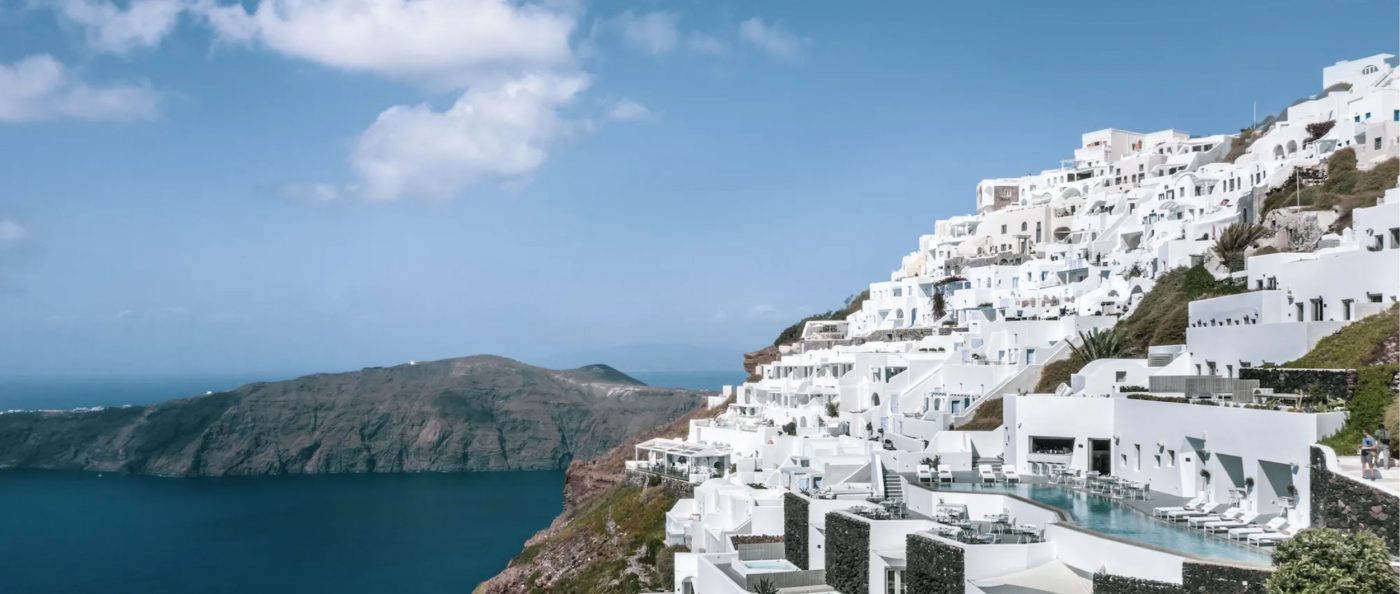 Infinity pool at Grace Hotel Santorini overlooking the caldera at sunset – Europe’s No.1 resort with exclusive CountryClubuk Member rates