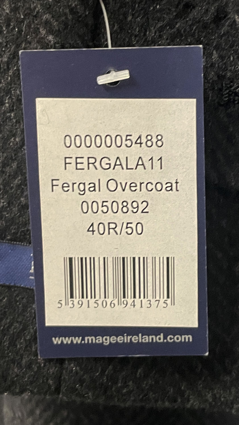Magee Fergal Overcoat label showing 90% wool and 10% cashmere composition