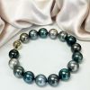 Exquisite 12mm natural Tahitian Black South Sea Pearl Bracelet: the Midnight Harmony Limited Edition Bracelet: bold, iridescent, unique