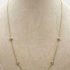 Close-up of bezel-set natural diamonds on Effy 14ct gold station necklace showing craftsmanship and sparkle