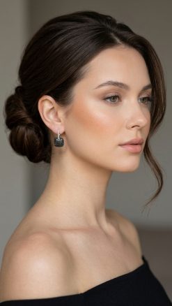 Woman wearing Effy black diamond pavé square drop earrings 14K white gold