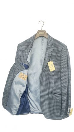 Interior view showing luxurious contrasting lining of Gurteen Monza indigo check jacket