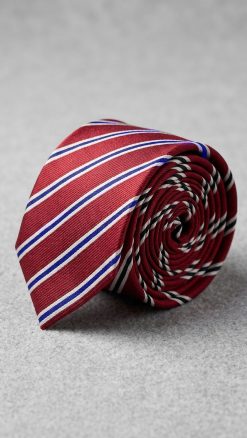 Close-up of red, white and blue striped pure silk tie showing luxurious weave – high quality mens striped tie in true British fashion