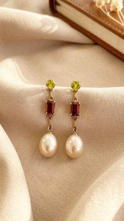 Seraphine pearl earrings in detail: CountryClubuk Members' price.