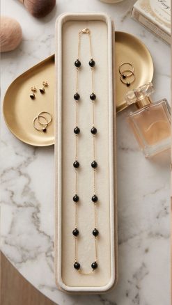 Shadow Flame black onyx beaded station necklace 14K yellow gold 20 inch at CountryClubuk Members' price