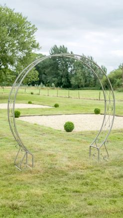 Elegant Ascalon Moon Gate garden arch in powder-coated finishes. A striking circular garden structure.