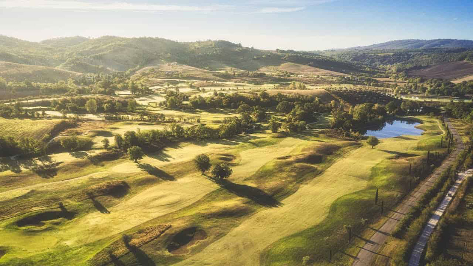 GEO-certified 18-hole golf course at Terme di Saturnia winding through the Maremma hills in southern Tuscany