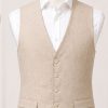 The Viago stone linen waistcoat by Gurteen styled for elegant summer weddings and occasions