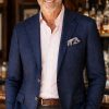 The Viago navy linen jacket by Gurteen styled for relaxed summer evenings and country house occasions