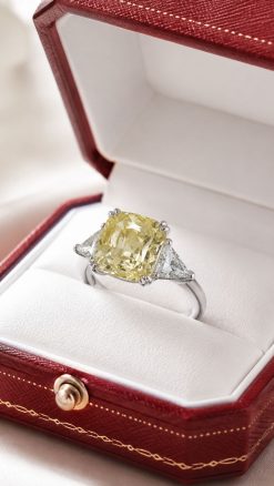 Natural unheated 4.50 carat Ceylon yellow sapphire ring with trillion-cut diamonds handmade in platinum
