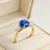Natural Ceylon blue sapphire ring with marquise-cut diamonds in platinum and yellow gold by CountryClubuk