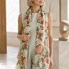 Morris Single Stem Coral silk scarf by Fox & Chave worn with pale celadon tailoring