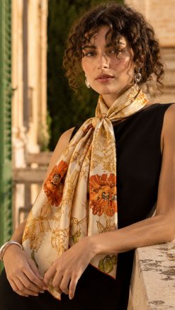 May Morris Poppies Habotai silk scarf worn with elegant black dress